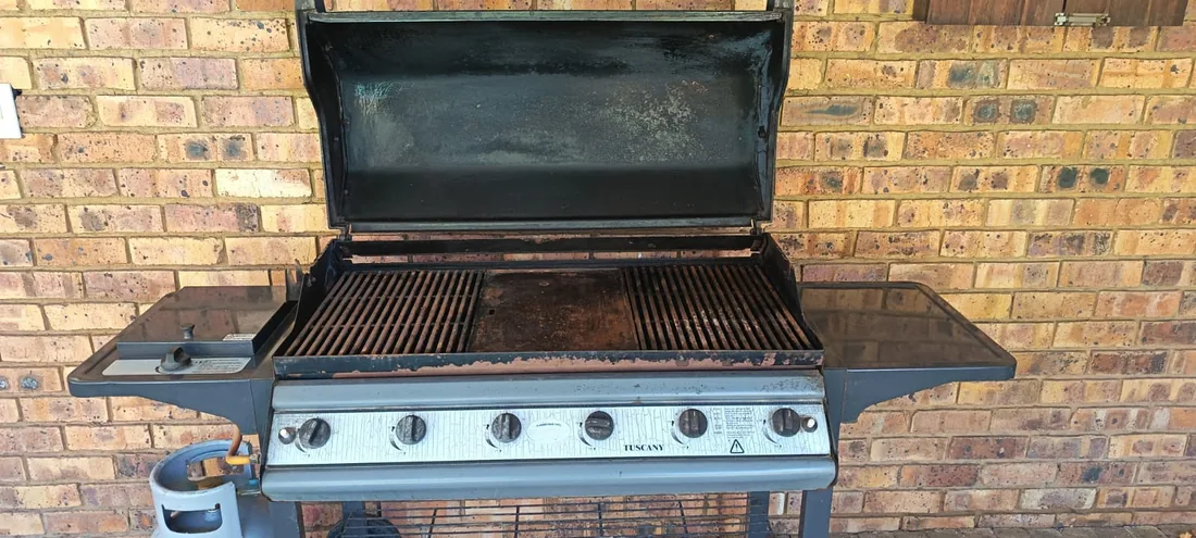 Technician providing gas appliance repair service in Durban North